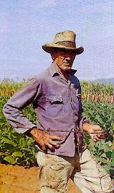 Man wearing a straw hat in Cuba